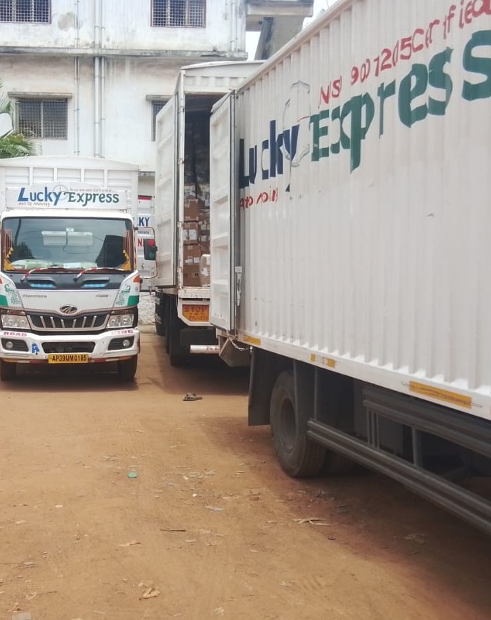 Lucky Express closed body lorries lined up for dispatch