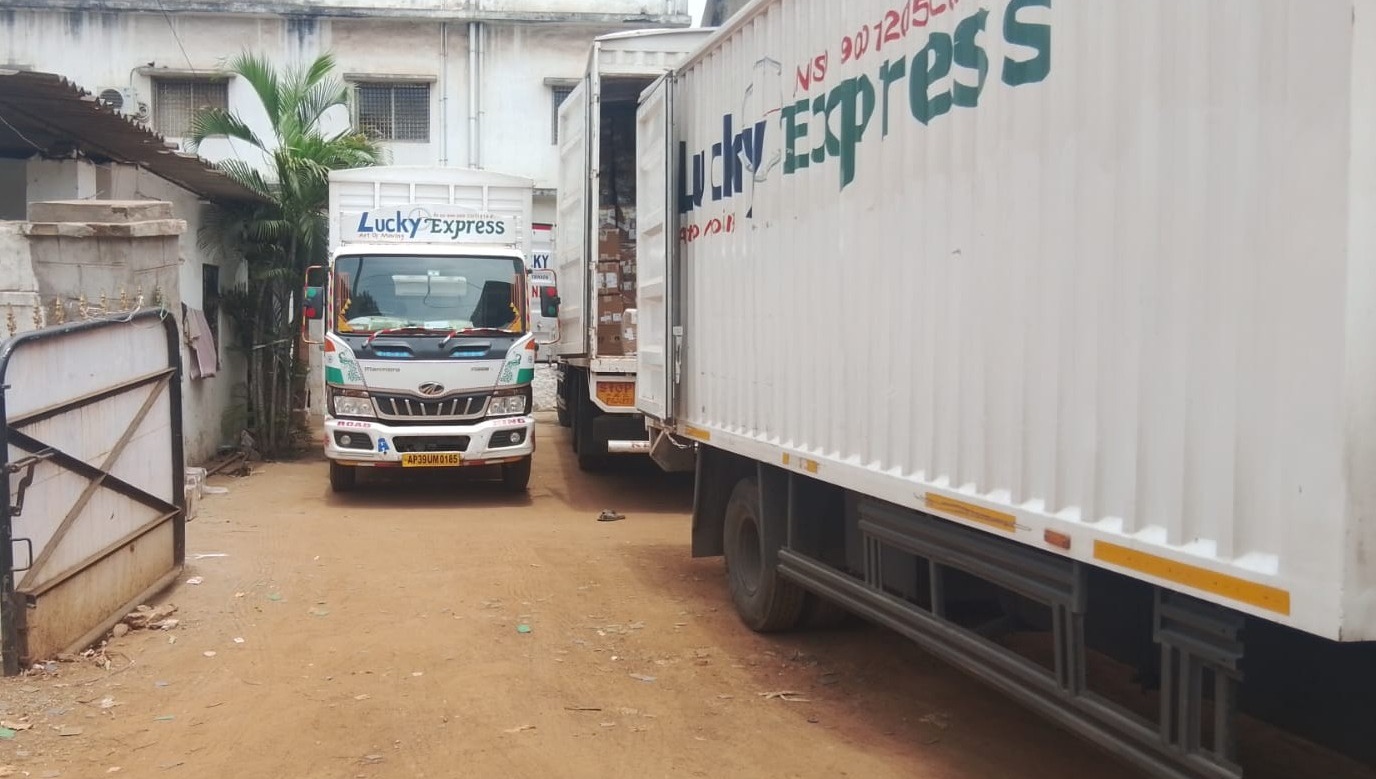 Lucky Express closed body lorries being loaded at the Gajuwaka branch in Visakhapatnam